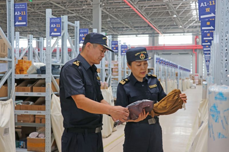 跨国购物“当日达”(图) 跨国购物“当日达”(图)